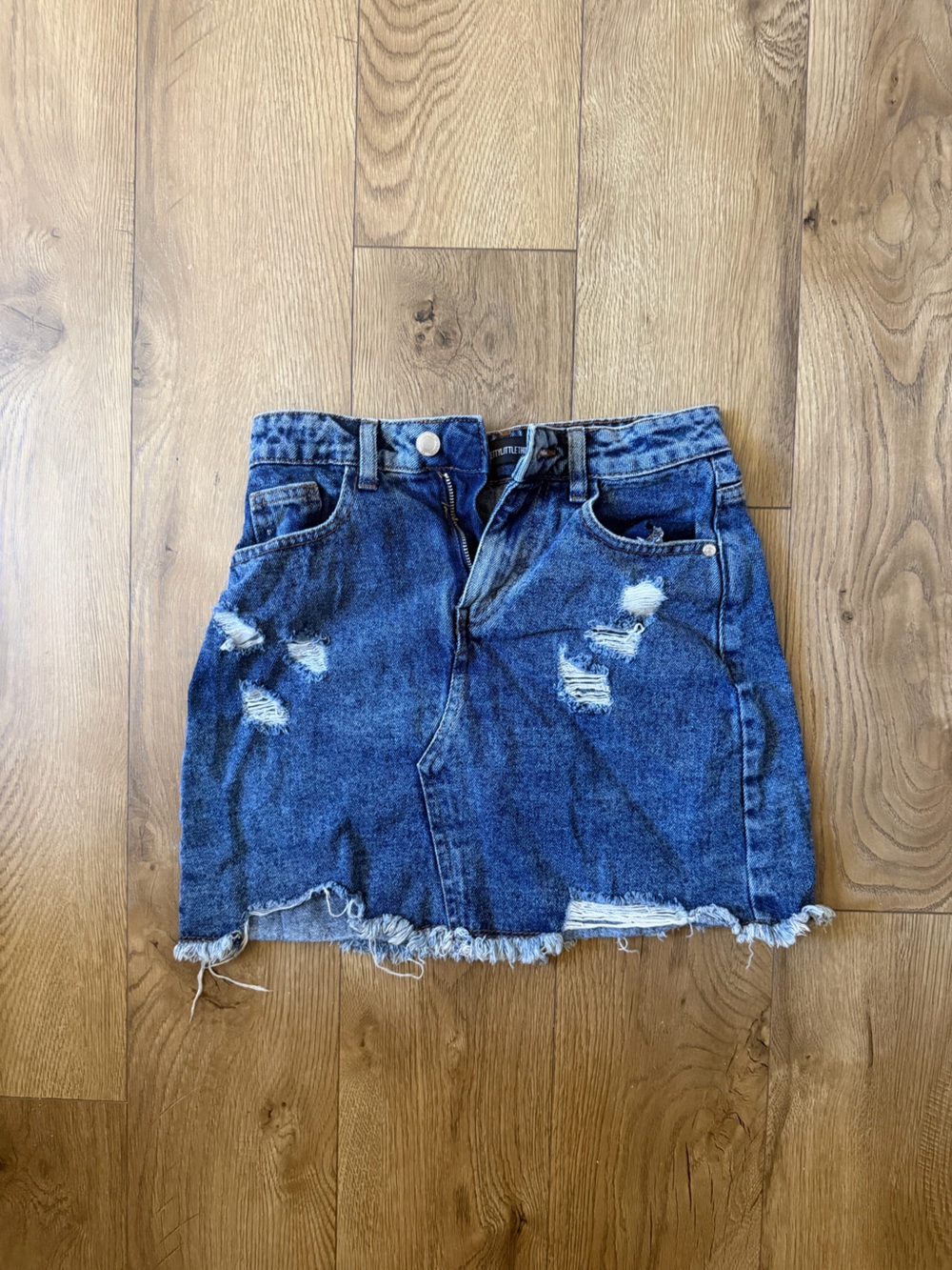 PrettyLittleThing Blue Distressed Denim Mini Shorts